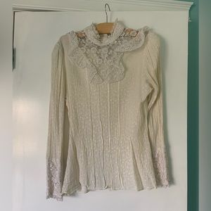Vintage Victoriana blouse. Fits a size S. Lacy with cute details